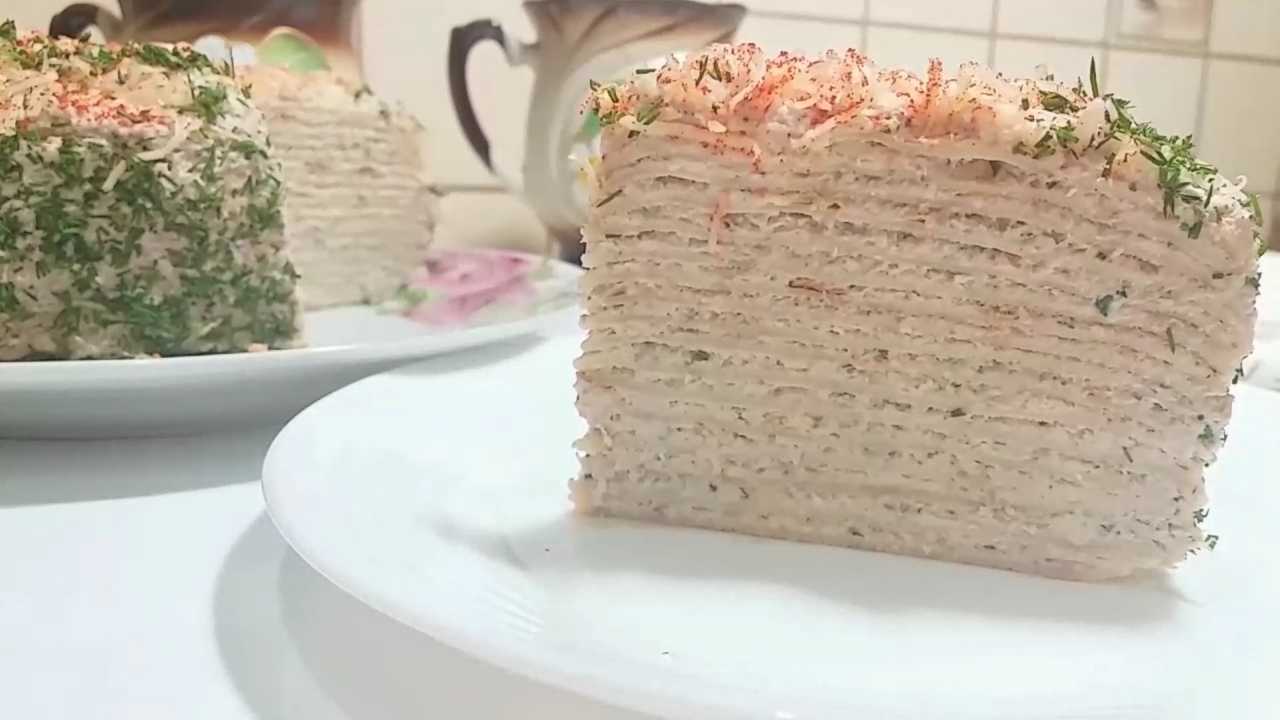 Пирог из слоеного теста с рыбными консервами и рисом «плетенка»